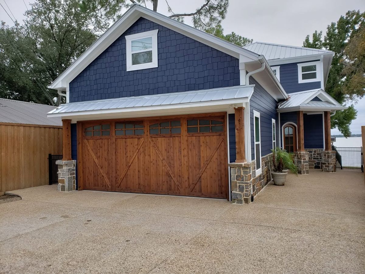 Custom cedar garage door installed by Caves Overhead Garage Door